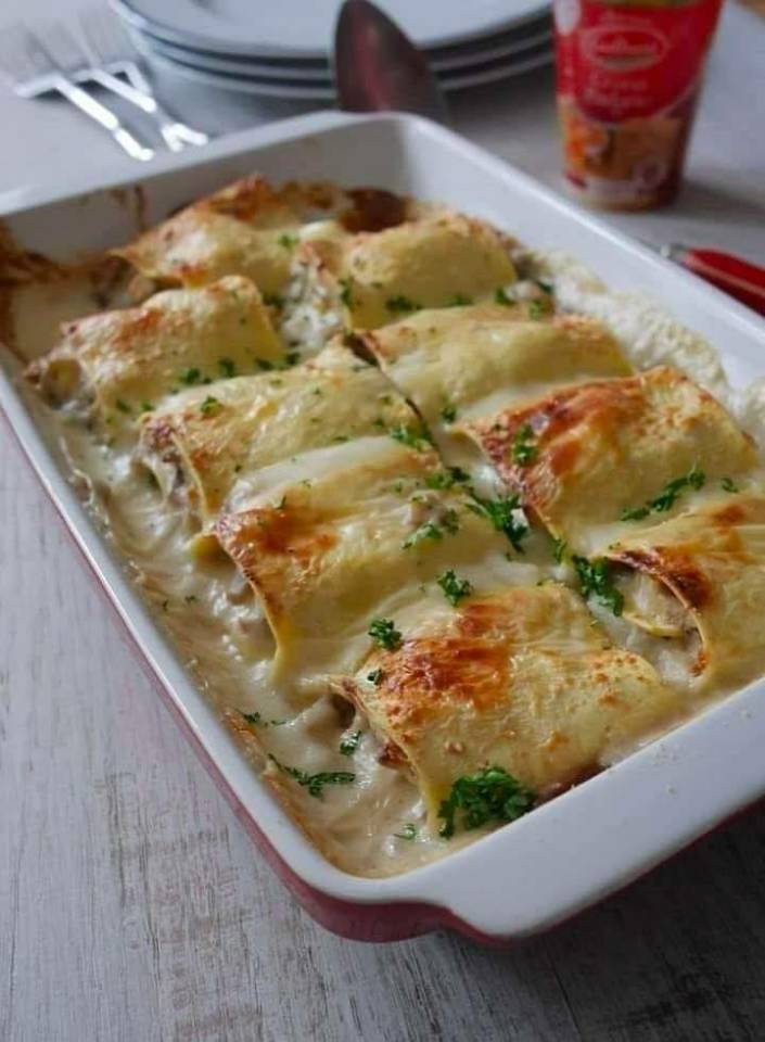 Lasagna rolls with ham and mushrooms